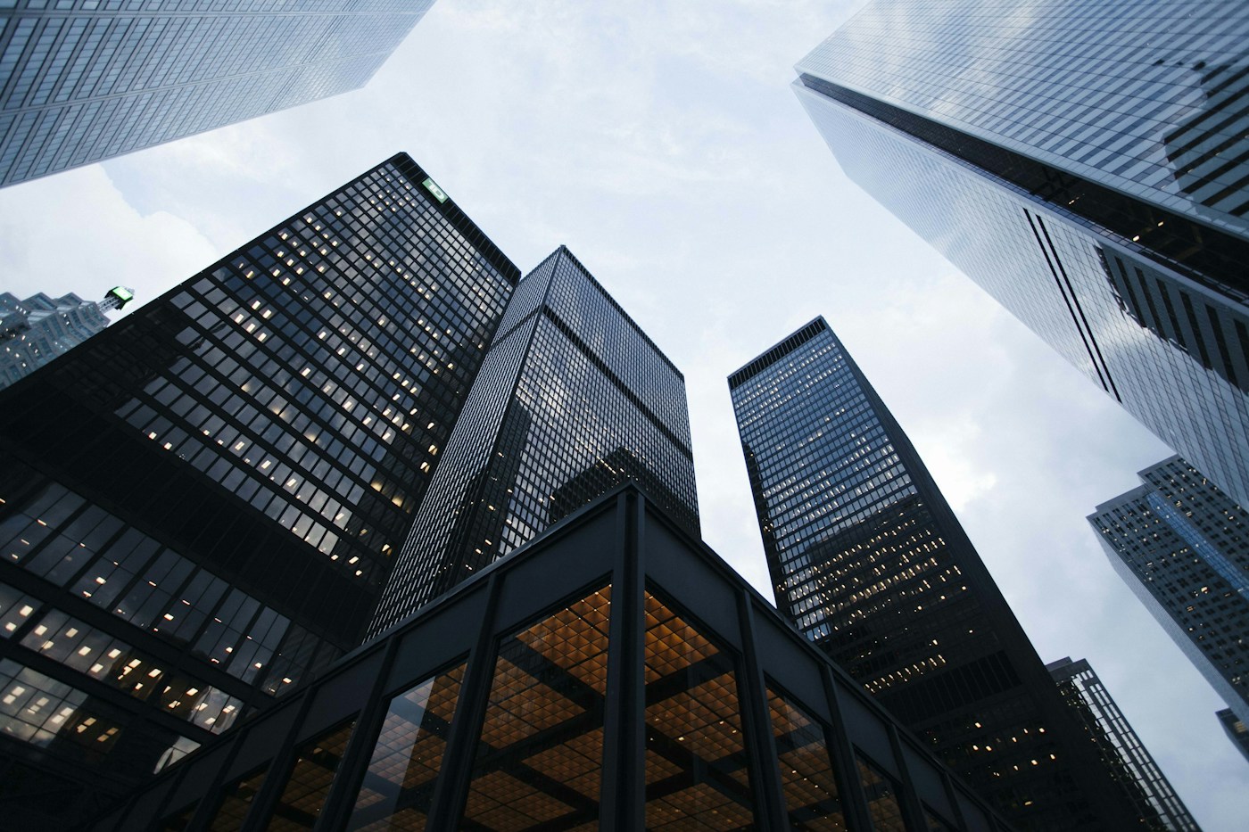 Interconnected glass office towers representing the markets and audiences CoreLink Media connects